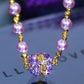 Elegant halskjede i perleimitasjon med glitrende magnetisk rhinestone-kule